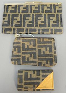Three Fendi canvas pieces including a wallet, change purse, and key holder, along with a dust bag.