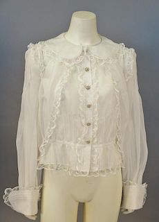 Chanel off-white blouse with ruffled edges, new with tag retail $3,900 RTW (size 38).