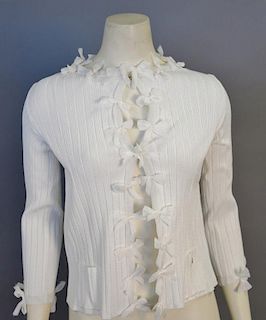 Chanel white cardigan with bow accents, new with tags retail $1,790. RTW (size 40).