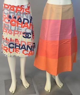 Chanel two piece skirt lot with A-line Chanel skirt and a full length A-line skirt with color blocks of tan, pink, melon, and orange.