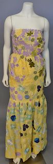 Givency Designer embroidered strapless dress, yellow appliqued with multi-colored flowers and leaves, excellent condition (leg. 50 in.).