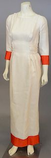 Christian Dior Paris Printems-Ete 1988 #23980 cream and orange long sleeve evening gown, this dress having silk orange trim.