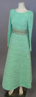 Green crinkle pleated silk evening gown attributed to Mary McFadden Couture having long sleeves with embroidered beaded belt middle section (lg. 55").