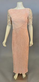 Mary McFadden Couture coral crinkle pleated evening gown with sequined sleeves (lg. 56").