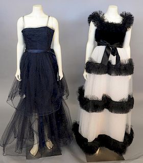Two Givencyh evening dresses to include navy blue dress with tiered net and a black and white velvet...