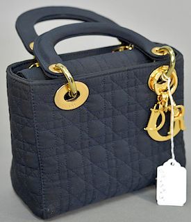 Christian Dior quilted mini black and navy blue threads satin handbag, this purse having red silk interior with satin handles and brass fittings.