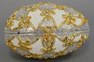 Judith Leiber jeweled egg minaudiere handbag with gold interior and original wrapped change...