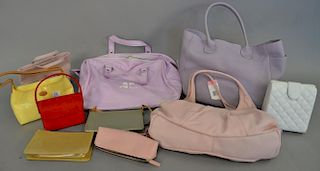 Group of ten handbags / purses including two Tods purses, a Unisa Resort large purple bag...