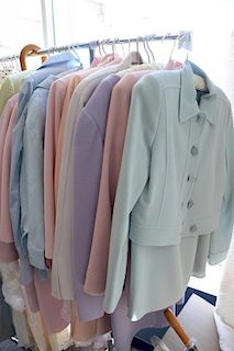Eleven womens designer suits and dresses and seven shirts and skirts to include Bill Blass, Janine Dray, John Anthony, Hartnell Tahari, Meada, Genny, 
