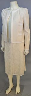 Chanel two piece suit lot to include off-white tweed jacket and a silk and sequin off-white skirt (size 2).