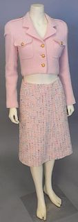 Chanel two piece suit with pink cropped tweed/novelty weave jacket with jeweled buttons and tweed pink with multi colors skirt.