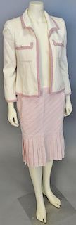 Chanel two piece lot including off-white jacket with pink trim and a cotton pink pleated skirt.
