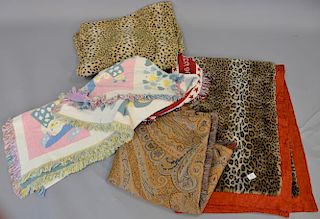 Five blankets including Etro leopard print; paisley; red, white, and blue; and two others.