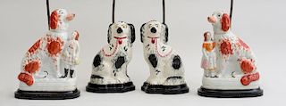 TWO PAIRS OF STAFFORDSHIRE POTTERY SPANIELS, MOUNTED ON LAMP STANDS