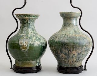 TWO SIMILAR HAN IRIDESCENT GREEN GLAZED POTTERY JARS, MOUNTED ON LAMP STANDS
