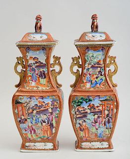 PAIR OF CHINESE FAMILLE ROSE PORCELAIN ANGULAR BALUSTER-FORM VASES AND COVERS, IN THE MANDARIN PALETTE