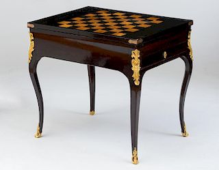 LOUIS XV ORMOLU-MOUNTED WALNUT AND EBONIZED PARQUETRY GAMES TABLE