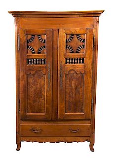 A French Provincial Fruitwood Armoire Height 69 x width 39 x depth 15 1/2 inches.