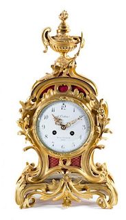 A Louis XV Style Gilt Bronze Mantel Clock Height 19 1/4 inches.