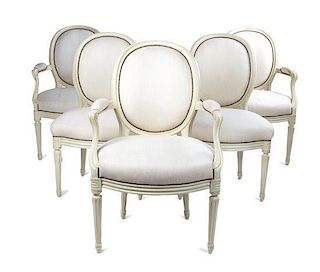 A Set of Four Louis XVI Style Painted Fauteuils Height of first 19 inches.