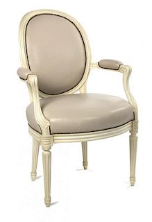 A Louis XVI Style Painted Fauteuil Height 37 inches.