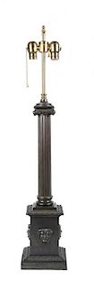 A Patinated Metal Table Lamp Height overall 23 inches.