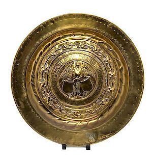 A Pair of Eastern European Brass Chargers Diameter of larger 22 inches.