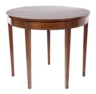 A George III Style Mahogany Flip-Top Table Height 30 x width 36 x depth 17 3/4 inches.