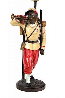 A Painted Metal Figure of a Zouave Soldier Height overall 25 inches.