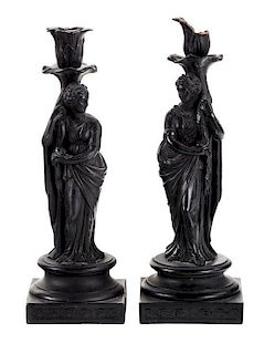 A Pair of Wedgewood Basalt Figural Candlesticks Height 11 inches.