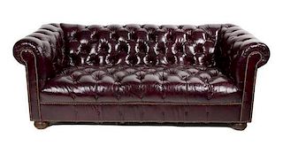 A Chesterfield Leatherette Sofa Height 28 1/2 x width 76 x depth 35 inches.