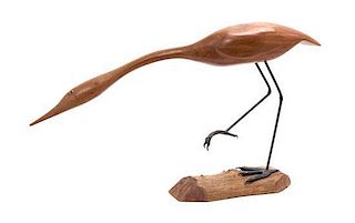 A Carved Wood and Iron Figure of a Heron Length overall 29 inches.