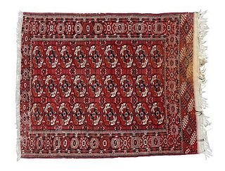 A Turkoman Wool Rug 5 feet 4 inches x 4 feet 4 inches.