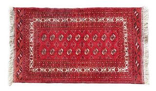 A Turkoman Wool Rug 6 feet x 3 feet 6 inches.