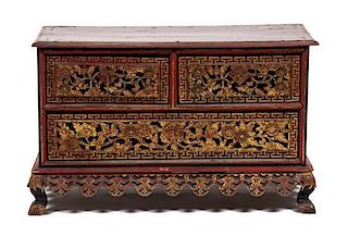 A Chinese Parcel Gilt Red Lacquer Carved Chest on Stand Height 22 x width 36 x depth 16 inches.