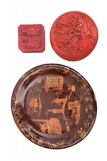 Two Cinnabar Boxes and a Chinese Lacquered Dish Diameter of largest 12 3/4 inches.