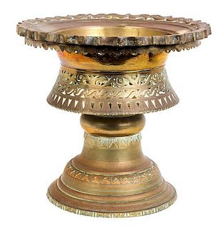 A Large Indonesian Brass Footed Bowl Height 11 inches; diameter 11 1/2 inches.