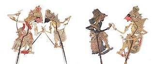 A Collection of Four Indonesian Wayang Kulit Shadow Puppets Height of tallest 33 inches.