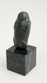 FIGURE OF A SEATED MONKEY