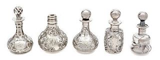 * A Group of Five Silver Overlay Glass Perfume Bottles Height of tallest 3 1/2 inches.