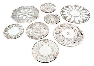 * Eight Silver Overlay Glass Trivets Diameter of largest 12 inches.