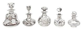 * A Group of Five Silver Overlay Glass Perfume Bottles Height of tallest 4 3/4 inches.