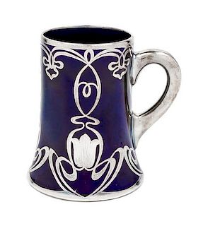* A Lenox Art Nouveau Silver Overlay Porcelain Mug Height 5 3/8 inches.