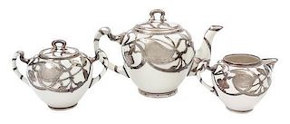 * A Lenox Porcelain Silver Overlay Tea Service Height of teapot 5 inches.