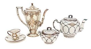 * An Assembled Lenox Porcelain Silver Overlay Tea Service Height of first 8 1/2 inches.