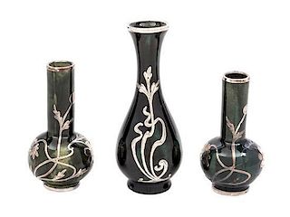 * Three Ceramic Silver Overlay Cabinet Vases Height of tallest 5 inches.