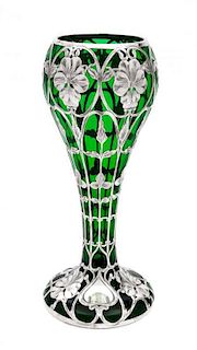 * An Art Nouveau Silver Overlay Glass Vase Height 10 inches.