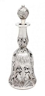 * An Art Nouveau Silver Overlay Glass Decanter, retailed by Black, Starr & Frost Height 10 3/4 inches.