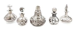 * A Group of Five Silver Overlay Glass Bottles Height of tallest 4 1/4 inches.