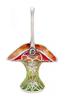 * An Iridescent Glass Silver Overlay Basket, manner of Loetz Height 10 inches.